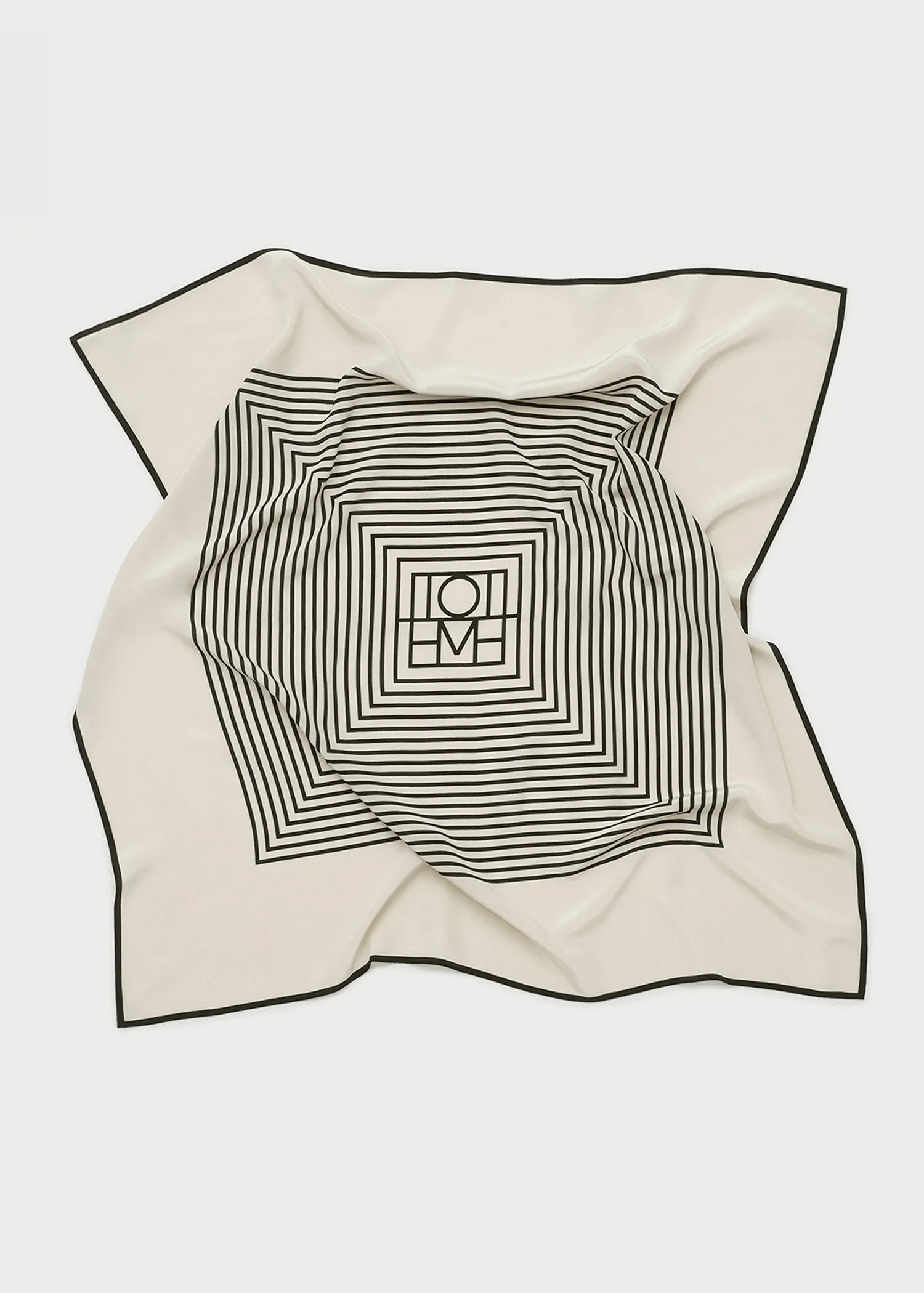 Centered monogram silk scarf crème